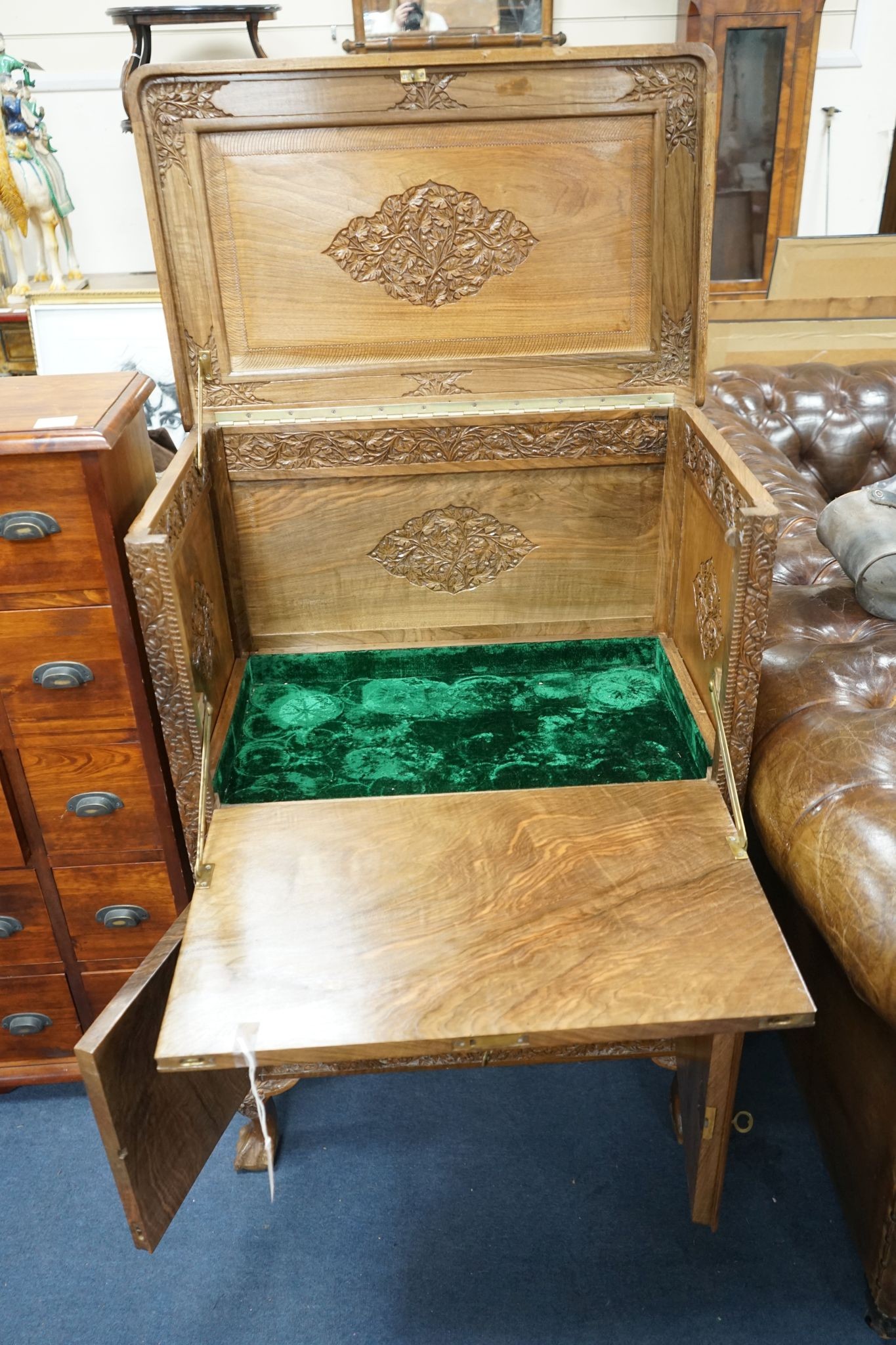 A Kashmiri carved hardwood cocktail cabinet, width 67cm, depth 42cm, height 96cm